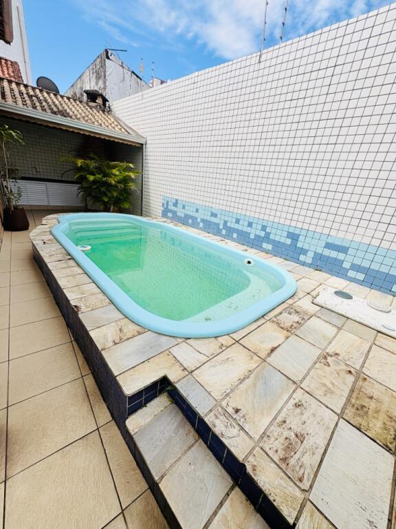 Casa com 4 quartos e 210 m² em Vila Tupi, Praia Grande